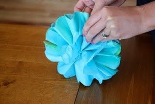 A tissue paper pom pom ball