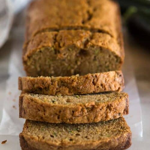 A loaf of sliced zucchini bread