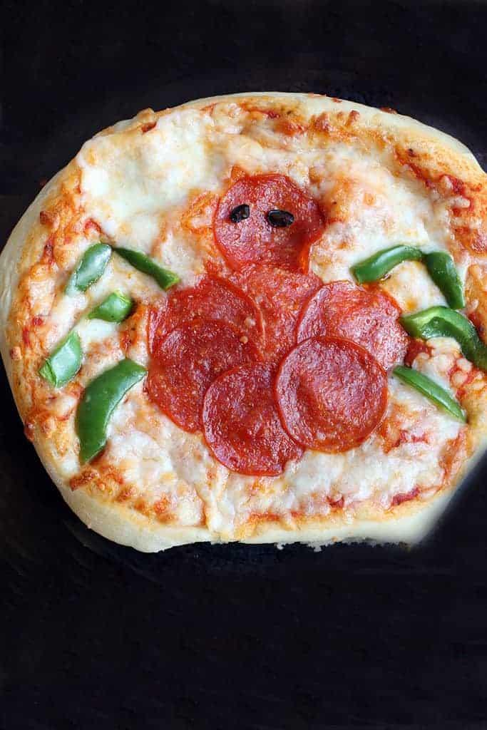 Mini Halloween Pizzas recipe on TastesBetterFromScratch.com
