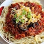 Cowboy Spaghetti recipe on TastesBetterFromScratch.com -- traditional spaghetti sauce is given a smokey, BBQ flavored twist!