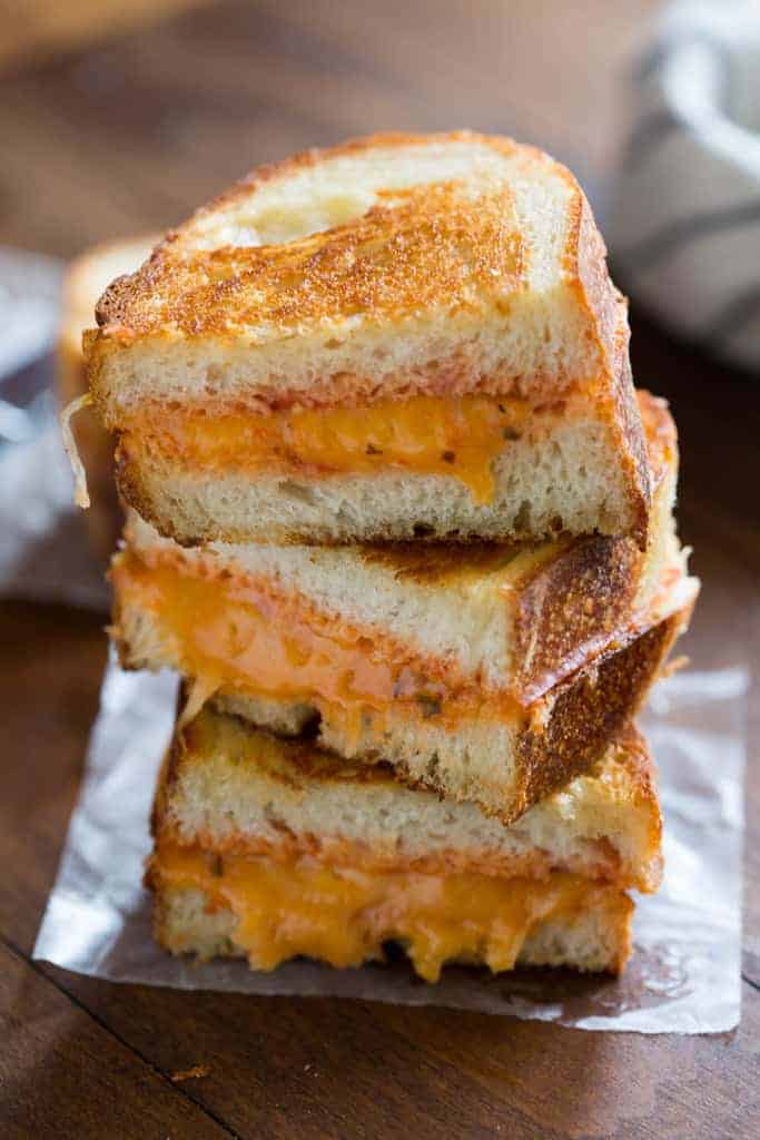 Three halves of an Italian Grilled Cheese Sandwich stacked on one another.