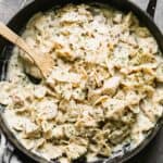 A large skillet with one pan healthy chicken alfredo.