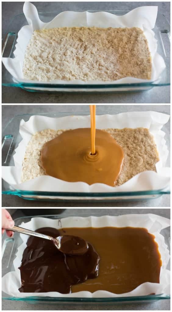 Three photos showing the process for making homemade twix bars, including a shortbread crust baked in a glass 9x13'' pan, caramel poured on top of the crust, and melted chocolate smoothed over the caramel, with a spoon