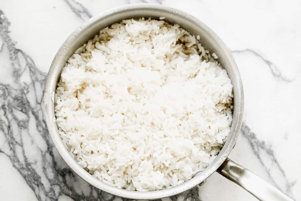 Cooked coconut rice in a saucepan.