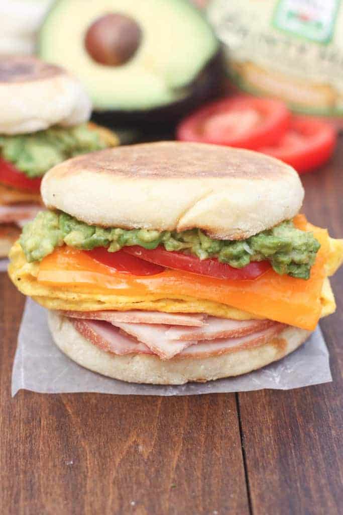 Cheesy Egg, Avocado and Ham Breakfast Sandwiches are perfect for using your leftover ham! They also make the best, easy freezer meals. | Tastes Better From Scratch