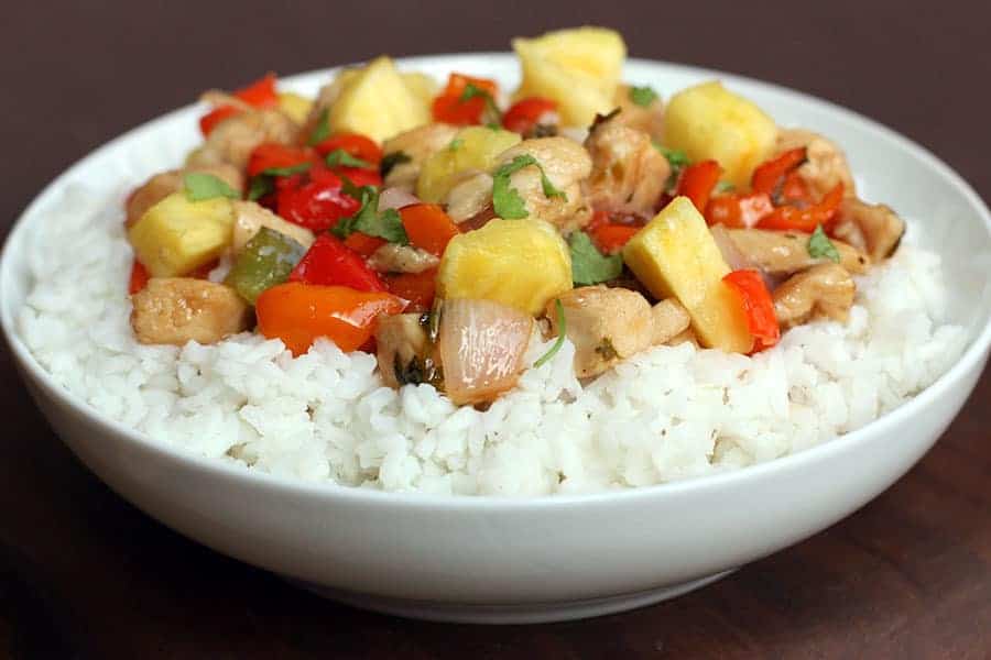 Stir-Fry chicken and vegetables in a chipotle sweet and spicy sauce. Served over rice with fresh pineapple! Would taste great in a lettuce wrap too!