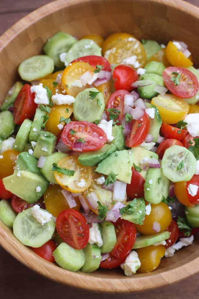 Tomato Cucumber Avocado Salad is the perfect EASY, light and fresh summer side dish. | Tastes Better From Scratch