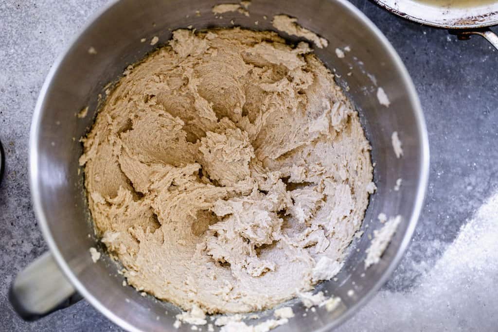 A mixing bowl with butter and sugar creamed as a start to browned butter cookie dough.