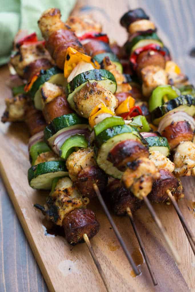 Cajun Chicken and Sausage Kebabs with bell peppers, zucchini and onion. 