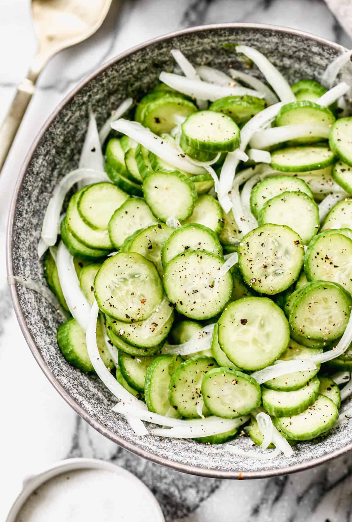 Easy cucumber and onion salad in a bowl.