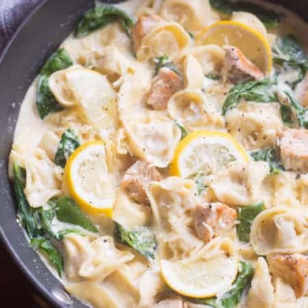 One Pan Creamy Lemon Chicken Tortellini - an easy one pan pasta dish that the entire family will love. Tortellini pasta with grilled chicken and fresh spinach in a warm, cheesy lemon garlic sauce. | Tastes Better From Scratch