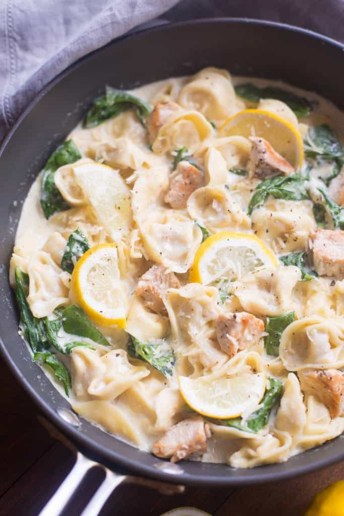 A pan filled with Creamy Lemon Chicken Tortellini.