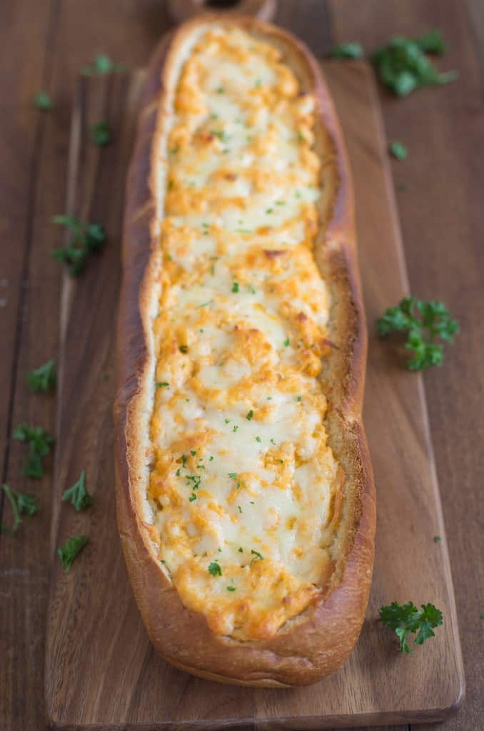 A baguette filled with buffalo chicken mixture. 