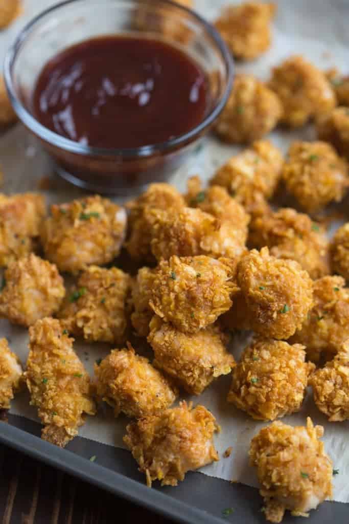 Crispy on the outside, juicy on the inside, BAKED Popcorn Chicken, served with your favorite dipping sauce! | Tastes Better From Scratch
