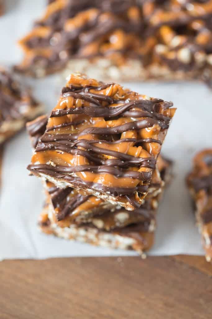 An overhead image of four Salted Chocolate Caramel Pretzel Bars stacked in a tower.