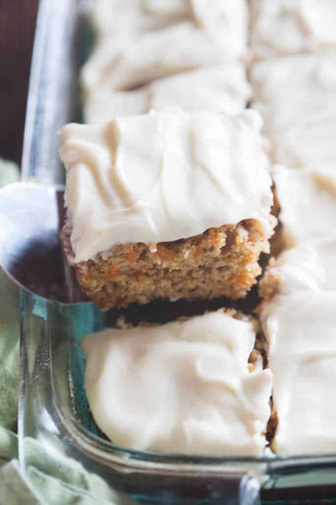  This classic, no-nonsense carrot cake recipe is The BEST! Perfectly light and moist with a light, whipped cream cheese frosting. | Tastes Better From Scratch