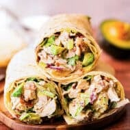 This healthy Chicken Avocado Wrap recipe is loaded with chicken, avocado, bacon, lettuce, and a creamy lemon sauce. It's ready in just 15 minutes and absolutely delicious!