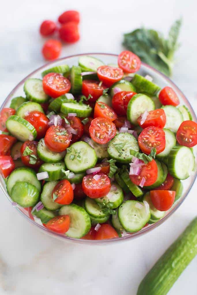 Tomato Cucumber Avocado Salad is the perfect easy and healthy side dish for your summer BBQ! | tastesbetterfromscratch.com
