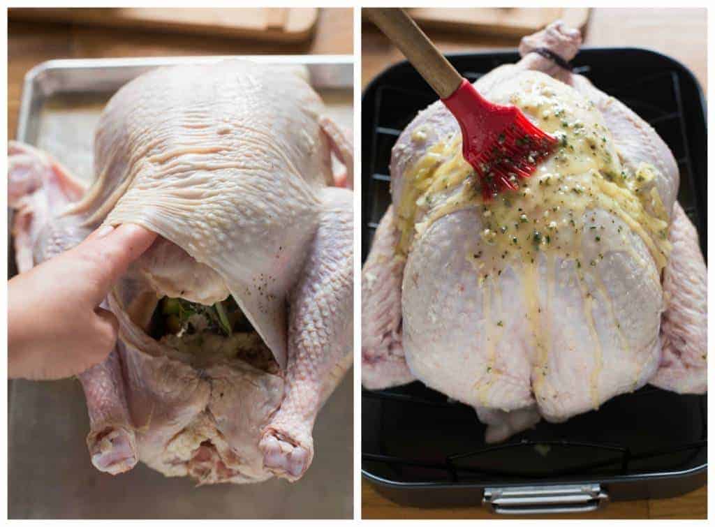Preparation of a thanksgiving turkey including fingers loosening the skin on the breast of an uncooked turkey. Then the turkey is placed in a roasting pan and basted in softened herb butter before being roasted in the oven.