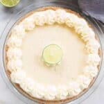 The easiest and BEST Key Lime pie! Creamy, luscious and perfectly tart Key Lime Pie with either an easy homemade graham cracker crust or a gingersnap cookie crust. | tastesbetterfromscratch.com