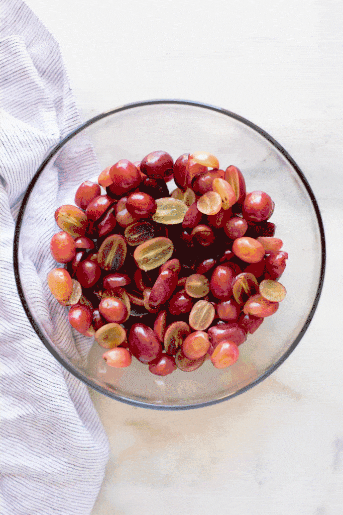 GIF video of the layering process to make a Holiday cranberry fruit salad.