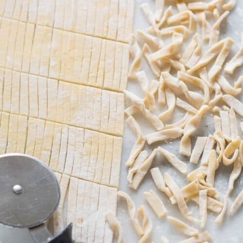 Homemade Egg Noodles with 4 simple ingredients and no special equipment needed. These delicious noodles are perfect for soups, stews, stroganoff of plain with butter and cheese. | tastesbetterfromscratch.com
