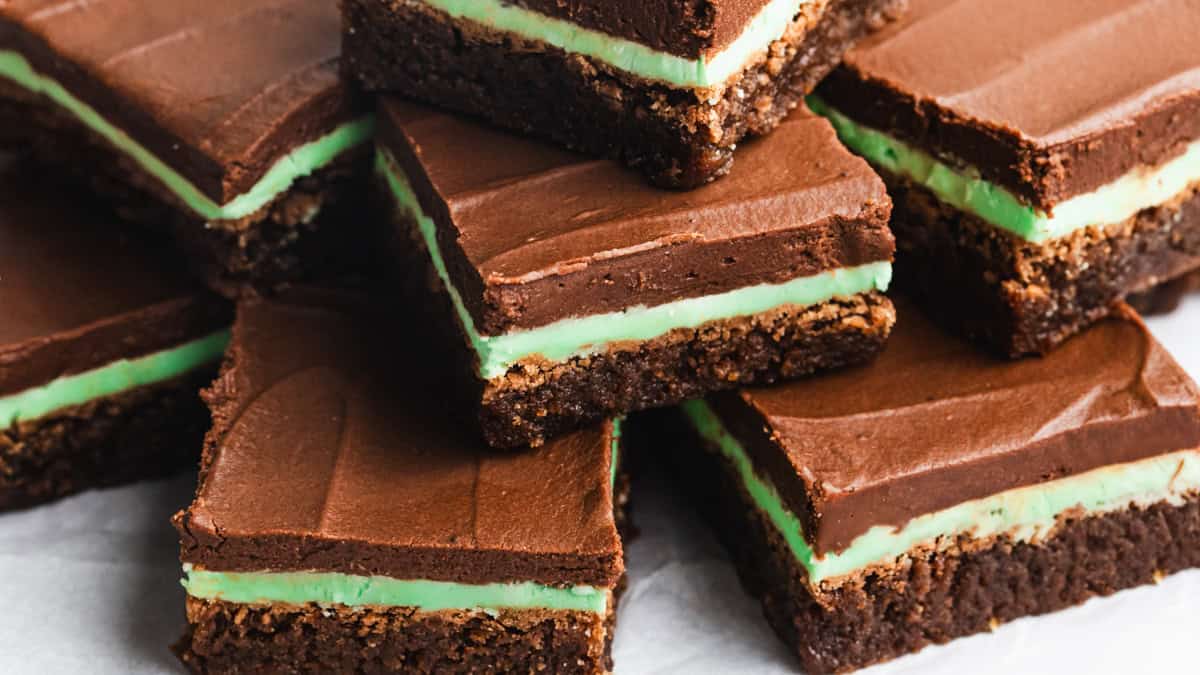 This easy Mint Brownies recipe could be from a bakery! They are fudgy, moist, and has a homemade mint frosting and chocolate frosting. It's impossible to eat just one!