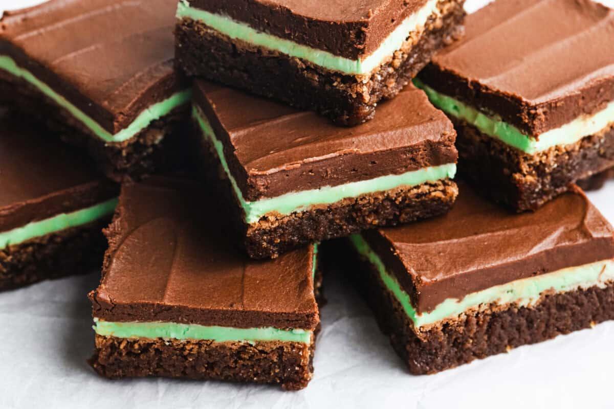 This easy Mint Brownies recipe could be from a bakery! They are fudgy, moist, and has a homemade mint frosting and chocolate frosting. It's impossible to eat just one!