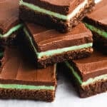 This easy Mint Brownies recipe could be from a bakery! They are fudgy, moist, and has a homemade mint frosting and chocolate frosting. It's impossible to eat just one!