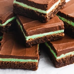This easy Mint Brownies recipe could be from a bakery! They are fudgy, moist, and has a homemade mint frosting and chocolate frosting. It's impossible to eat just one!