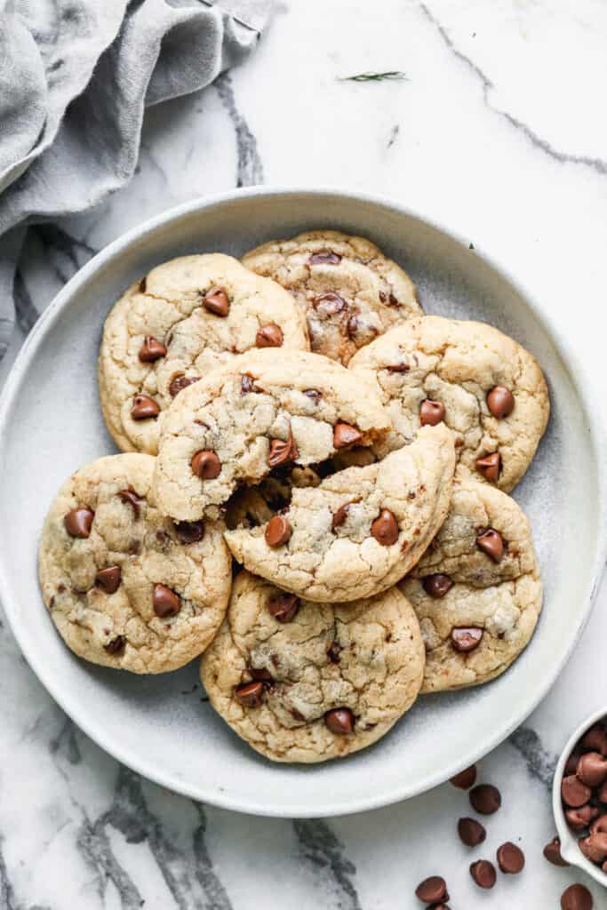 A plate of warm chocolate chip cookies.