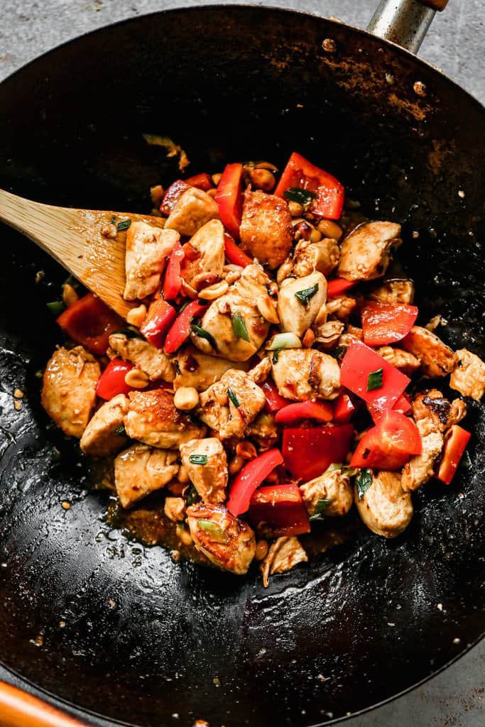Kung Pao Chicken cooking in a wok.