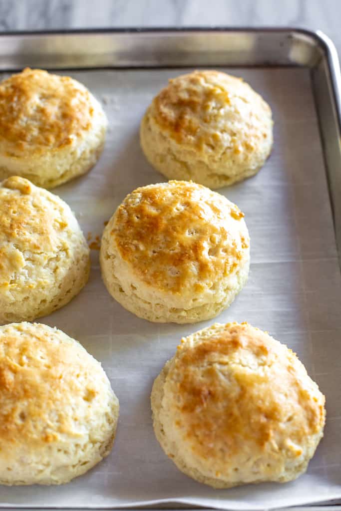 Baked biscuits on a hot pan right out of the oven.