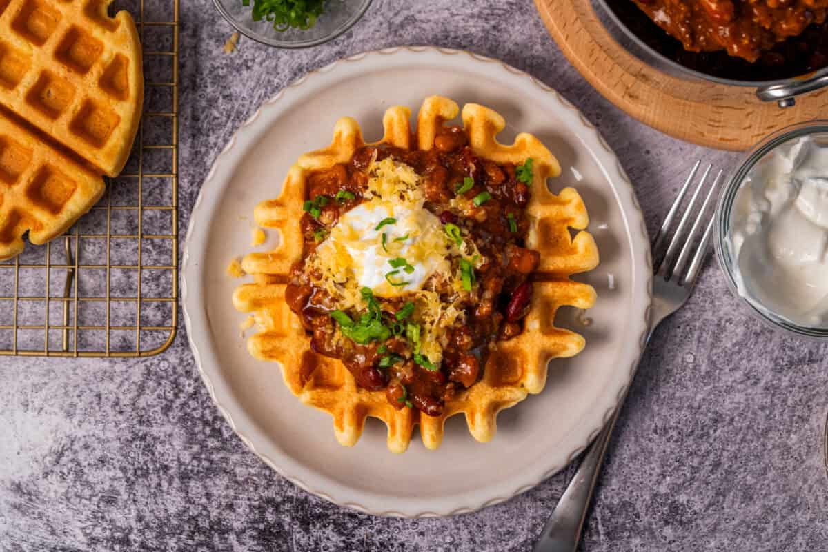 This easy Cornbread Waffle recipe is an easy and hearty meal that perfectly marries cornbread and chili in such a fun and creative way everyone will love.