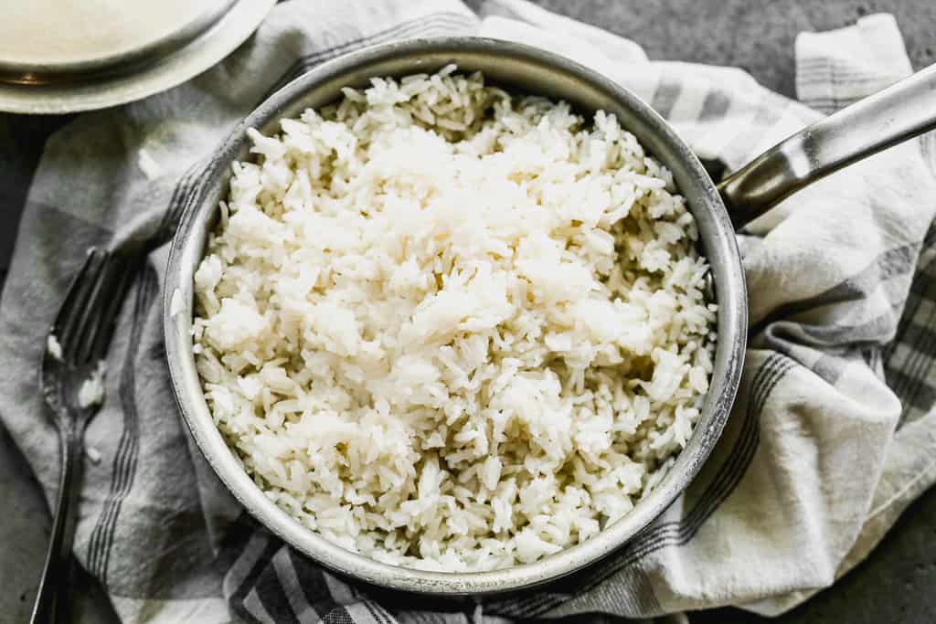 Cooked coconut rice in a saucepan.