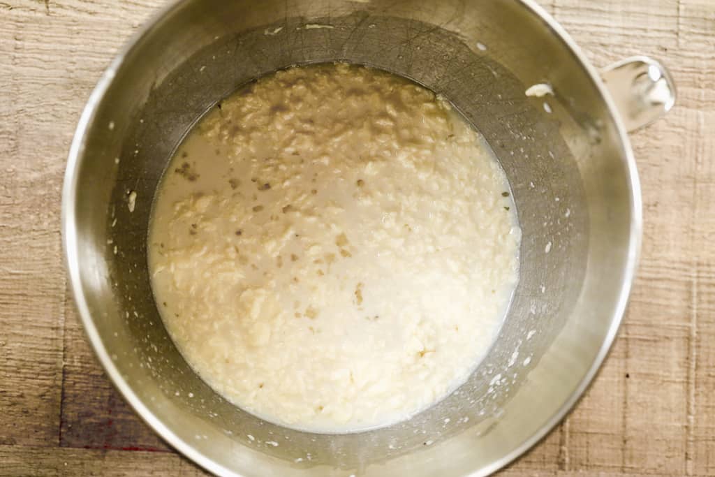 Yeast, water and sugar proofing in a bowl.