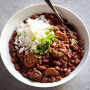 A bowl of cajun red beans and white rice that was cooked in the Instant pot.