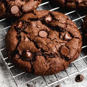 The best Double Chocolate Cookie on a cooling rack, ready to enjoy.