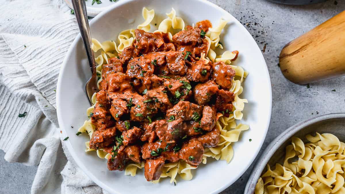 This beef Porkolt recipe is flavorful, hearty, and an excellent comfort meal! I love serving it over homemade egg noodles.