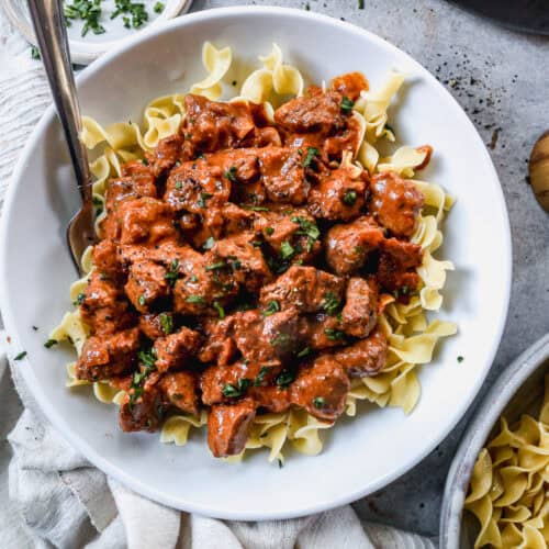 This beef Porkolt recipe is flavorful, hearty, and an excellent comfort meal! I love serving it over homemade egg noodles.