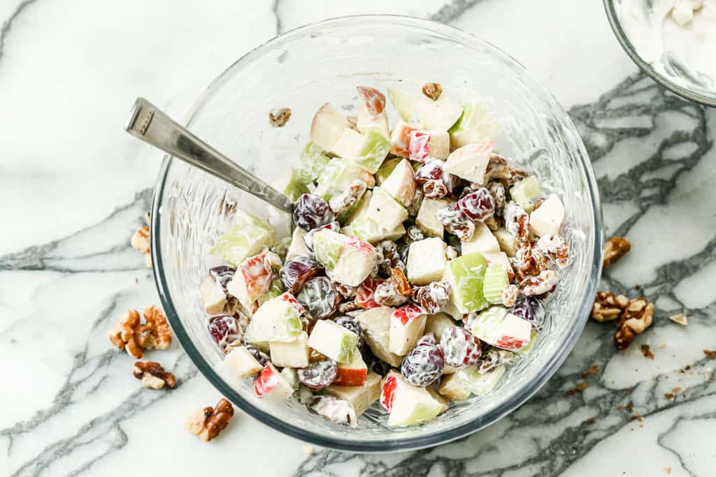 Waldorf Salad mixed together in a bowl.