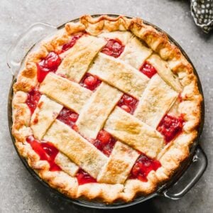 Overhead view of a baked cherry pie with lattice crust.