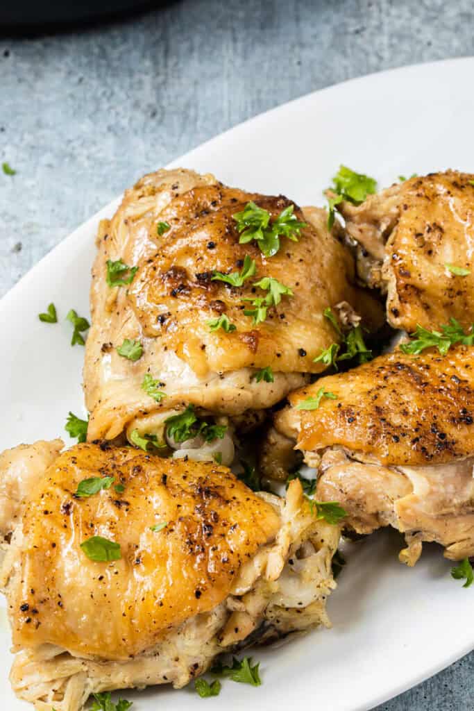 This instant pot chicken thighs recipe is easy, quick, and delivers tender and juicy chicken every time.