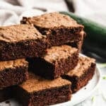 Fudgy Zucchini Brownies made from scratch, served on a plate, ready to enjoy.