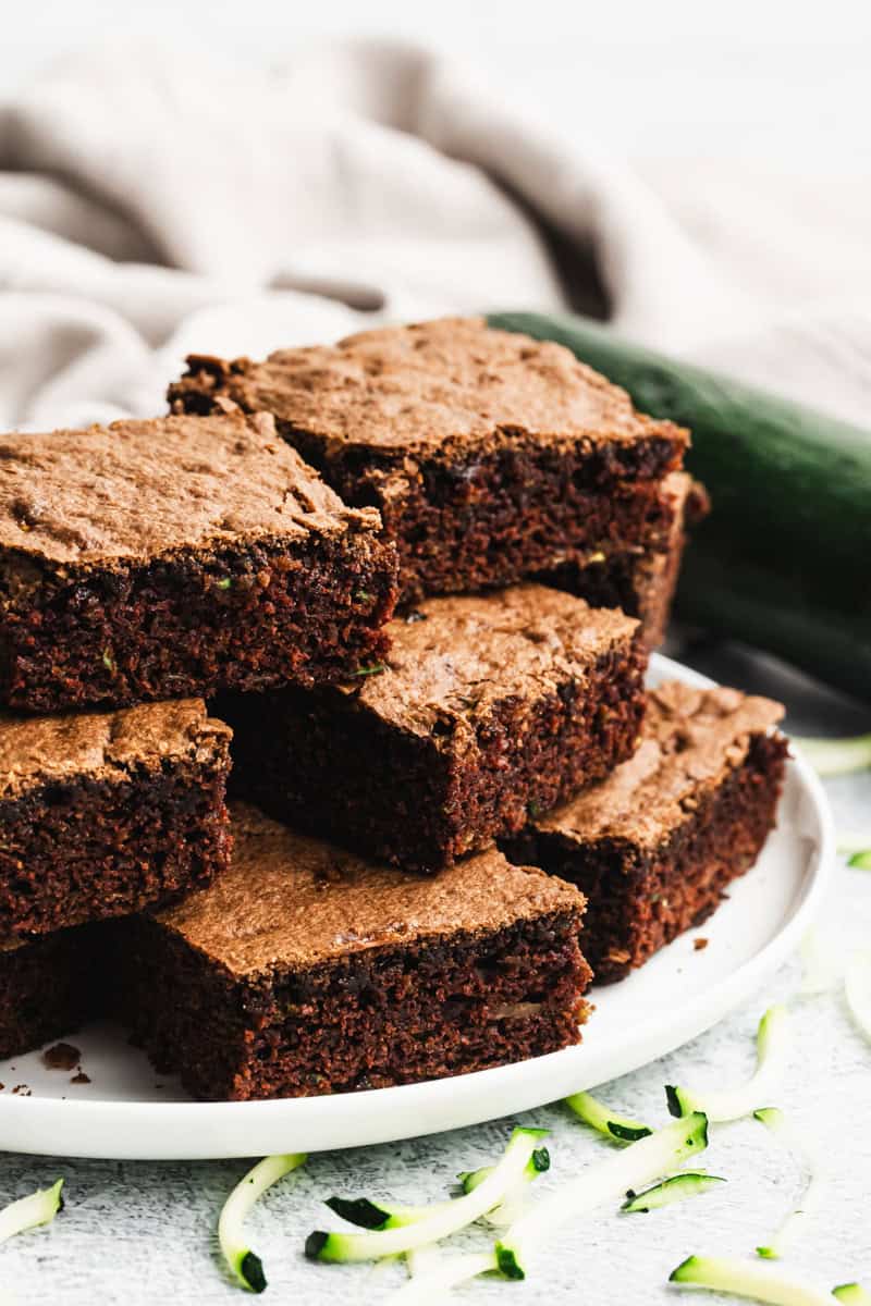 Fudgy Zucchini Brownies made from scratch, served on a plate, ready to enjoy.