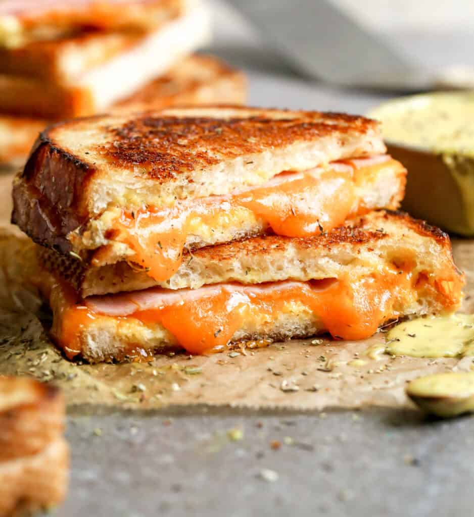 The best Grilled Ham and Cheese Sandwich has ham and melted cheese with crispy golden bread. It's an easy recipe that the whole family will enjoy!