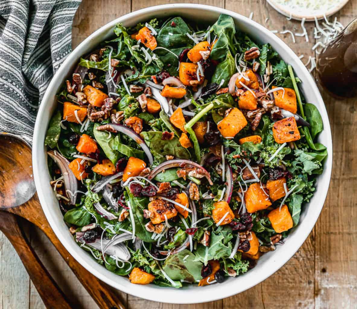 This Roasted Butternut Squash Salad is the perfect blend of warm, caramelized squash, crisp greens, and a tangy homemade dressing. It’s a flavorful and healthy fall salad recipe that makes a stunning side dish or light main course.
