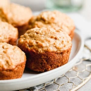 A plate of healthy Banana Oat Muffins ready to be enjoyed.