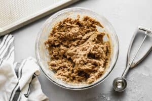 The dough for gingersnap cookies, in a mixing bowl.