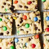 These easy M&M Cookie Bars only take 30 minutes to make and are easy to cut and feed a crowd! They are everyone's favorite cookie, now easier!